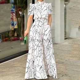 Casual Dresses Designer Dress 2024 Summer Women's Loose, Fashionable, Elegant Short sleeved Hanging Neck Art Printed jumpsuit Plus size Dresses