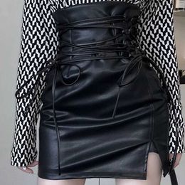 Skirts Black leather mini skirt for womens Gothic high waisted ultra-thin fitting lace pencil skirt for womens sexy club back zipper package hip skirtL2405