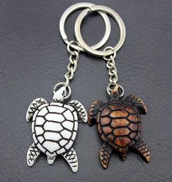 Jewellery Whole 12pcs Cool Men Women039s Car Keychains Imitation Yak Bone Carved Tortoise Key Chains Sea Turtles Keyrings for9951669