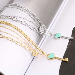 Pendant Necklaces Titanium Steel 18k Gold T Family Classic Blue Dropping Oil Key Love Double Layer Necklace Womens Fashion Collar Chain Q240507