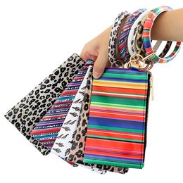 PU Keychain Coin Purses Bracelet Wallet Woman Handbag Leather Tassel Pendant Designers Handbags Leopard Sunflower Print Ladies Bag Gift 226m