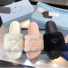 luxurys designers 2021 Winter Women House Slippers Faux Fur Fashion Warm Shoes Woman Slip on Flats Female Slides Black Pink Cosy h9864495