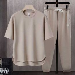 Men's Tracksuits 2024 Summer Mens Loose Track Clothing Fashion Round Neck Short Sleeve+Drawstring Pants Two Piece Set for Mens SportswearL2405