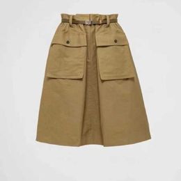 Luxury women's Short skirt Designer 24 Spring and summer the latest tooling wind big pocket skirt distribution metal buckle belt Short skirt for women
