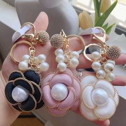 Keychains Lanyards Boutique French Fragrant Breeze Pearl Perfume Chain Camellia Flower Keychain Car Key Bag Charm Women Girl Keyring Gift Jewellery J240509