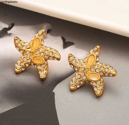 Nowy styl Designer V Letter Studs Kolczyki Wysokiej klasy kobiety Złota Pleceniona stal nierdzewna Inkrustowana kryształowa geometria rozgwiazda pierścień uszy biżuteria ślubna