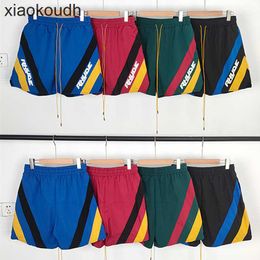 Rhude High end designer shorts for Chaopai Micro Stripe Contrast Casual Quick Shorts Mens and Womens High Street Beach Elastic Capris With 1:1 original labels
