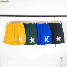 Rhude High end designer shorts for High Street Trendy Letter Printed Shorts Summer Loose Straight Mens and Womens Sports Beach Casual Pants With 1:1 original labels