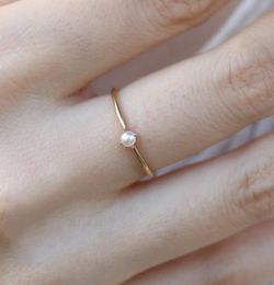 ZHOUYANG Ring For Women Delicate Mini Pearl Thin Ring Minimalist basic Style Light Yellow Gold Colour Fashion Jewellery KBR0105080343