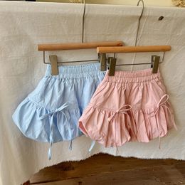 Kinderhosen Mädchen Shorts Sommerkinder Kleidung Blütenknospen Hosen losen Bogenknoten Elastische Taille Falten 2024 240508