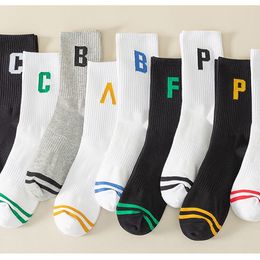 Spring and summer new men's and women's solid color tube socks breathable sweat absorption sports long socks Xinjiang cotton men's socks summer