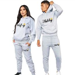 Mens Tracksuits Couple sports shirt husband and wife printed lovers clothing wool set fashionable mens hooded shirt pants 2piece set womens track and field clot