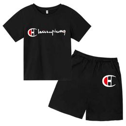 Clothing Sets Summer childrens top+shorts brand printed childrens T-shirt set for boys and girls aged 2-12 casual short sleeved cotton clothing setL240509