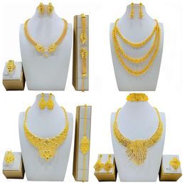 Jewellery with gold droplets and diamonds, bride's wedding necklace, earrings, rings, bracelets, four piece Jewellery set