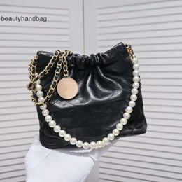 Chanells CChanel Chanelllies the Designer Bags Designers of New 22 s Mini Garbage Bags Pearl Chain in Paragraph One Shoulder His Hand Bag Leather Handbag Fashion