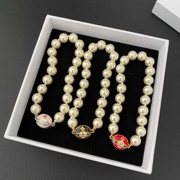 Designer Westwood Saturn pearl enamel magnetic suction bracelet versatile fashion the same as Lisa