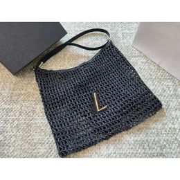 Designer Fashions Luxury Spring Summer Summer New Tote Laffie Grass Hollow Weave Women Designer Bolsa de praia Tootes Top qualidade Metal Letter Bolsa Bolsa de ombro