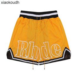 Rhude High end designer shorts for Spring and Summer Fashion and trendy Mesh Fabric Mens Basketball Sports Pants Casual Shorts With 1:1 original labels