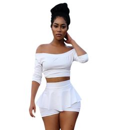 Nuovo Top Crop White Fashion e gonna set mezza manica sexy set da 2 pezzi da donna Slash Neck Codycon a due pezzi Female1119788