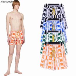 Rhude High end designer shorts for fashion letter arrow geometric graphic casual sports shorts for men and women high street beach pants With 1:1 original labels