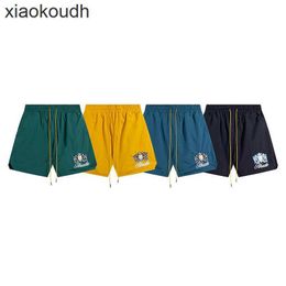 Rhude High end designer shorts for Chaopai Emblem Embroidered Elastic Casual Shorts Mens and Womens Beach Sports Capris With 1:1 original labels