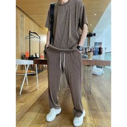 Men's Tracksuits Summer mens loose fitting ice sports track and field clothing fashionable casual short sleeved T-shirt and pants two-piece mens clothing setL2405