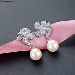 Fashion Classic Designer Diamond Blume Elegante Perle Anhänger Sterling Sier Stud Ohrringe für Frau aply