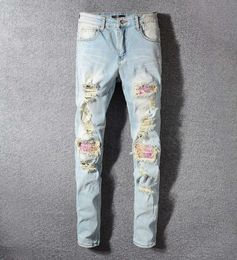 New Mens Stylist Jeans Blue Men Women Distressed Zipper Jeans Ripped Denim Pants Mens High Quality Pants5052417
