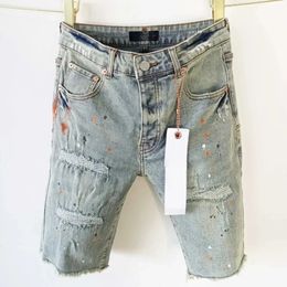 Jeans viola di alta qualità uomini marchi marchi vintage bordi lavati pantaloncini di jeans per uomo riparazione bassa sollevare pantaloni di jeans skinny 240509