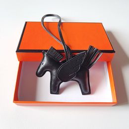 Womens Swift Sheepskin Horse Bag Charm Portable Keychains Paddock Keyring Real designer Leather Nano Pegasus Pendant Wing Flying Ornament for gifts 10x8cm