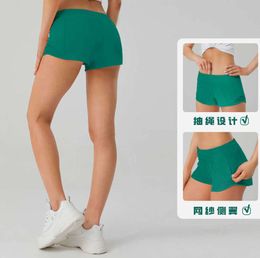 Sommar andas snabbtorkning sport Hotty Hot Shorts Womens Solid Color Pocket Runness Pants Princess Sportwear Gym Leggings65J