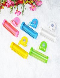 Whole 5 Colors Plastic Rolling Tube Squeezer Useful Toothpaste Easy Dispenser Bathroom Toothpaste Holder Bathroom Accessori8743468