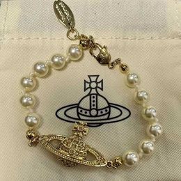 Designer Pearl Saturn Bracelet Westwood Silver Full Diamond Planet Design Light Luxury Versatile for Women Nail