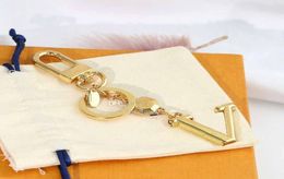 New High qualtiy brand Designer Keychain Fashion Purse Pendant Car Chain Charm Bag Keyring Trinket Gifts Accessories1490916