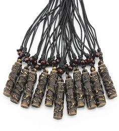 Jewellery Whole 12pcs COOL Boy men039s Simulation Bone Carving Totem Dragon Pendant Wood Beads Amulet Pendant Necklace Lucky 5520745