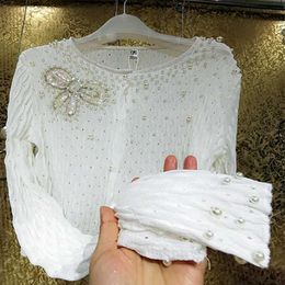 Women's Knits Tees Luxury industrial pearl crystal sequin sunshade cardigan womens bow hollow hook flower tight knitted jacketL2405