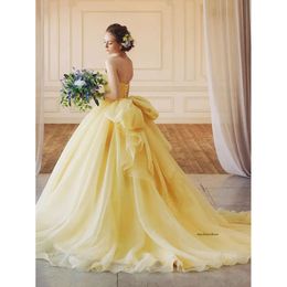 2021 Elegant underbar gul älskling bollklänning quinceanera klänningar spetsa applikation kväll prom klänningar stor bågen formell söt 15 party klänningsrockar de bal 0509