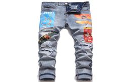 Yırtık delik Men039s baskı kot pantolon streç ince fit denim pantolon allmatch pantolon moda boyalı sokak kıyafeti pantalonlar pour hommes5229072