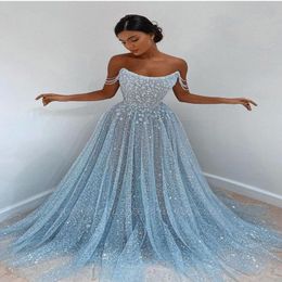 Stunning Light Sky Blue Sequined Evening Dresses Sexy Spaghetti Strap Backless Sheer Tulle Blingbling Sequins Long Formal Occasion Prom 290k