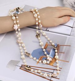 New fashion luxury designer elegant beautiful flowers white pearls long chain sweater statement necklace for woman7458350