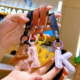 Keychains Lanyards 26 Letters Keychain Custom Made PU Faux Leather Initial English Letters Keychain Pendant Women Bag Charms Keyring J240509