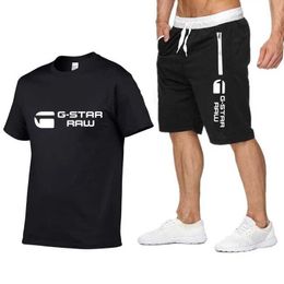 Men's Tracksuits 2024 New Summer Mens Track and Field Suit 100% Cotton T-shirt Shorts 2-piece Set of Sportswear Casual Mens Wear Y240508