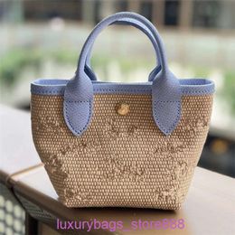 Designer Bag Stores Are 95% Off Grass Embroidered Knitted One Shoulder Handheld Vegetable Basket Water Bucket Simple and Fashionable WomensP0MK