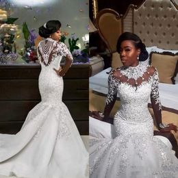 2018 Luxurious High Neck Mermaid Wedding Dresses Special Crystals Sheer Long Sleeve Mermaid Appliques Bridal Wedding Gowns Vestido De N 282P