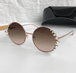 Luxury 0295 Sunglasses Brand Designer Charming With Pearl Woman Fashion Round Sunglasses Top Quality UV Protection With Original 7133906