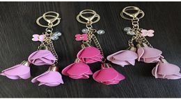 EUB 20pcs 18colors charm leather rose flower key chains tassel flower keychains women keychain bag purse pendant jewelry266r7205433