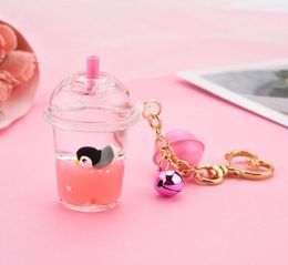 Keychains Acrylic Milk Bottle Keyring Tea Cup Keychain Marine Animal Liquid Floating Key Chains Charm Bag Pendant Car Ring2774815