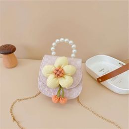 Korean version of children's pearl handbag new style shoulder cartoon cute flower zero wallet women's crossbody bag 78% factory wholesale