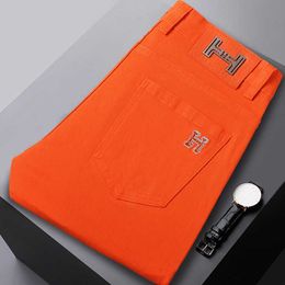 Kong Hong Summer Thin and Bright Orange Jeans Mens Trendy Brand Embroidered Korean Edition High End Luxury Slim Fit Small Feet Pants