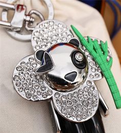 Luxury Designer Keychain Stylish Sunflower Doll Pendant Keychains Panda Keys Buckle Mens Womens Bag Key Ornaments High Quality5399995